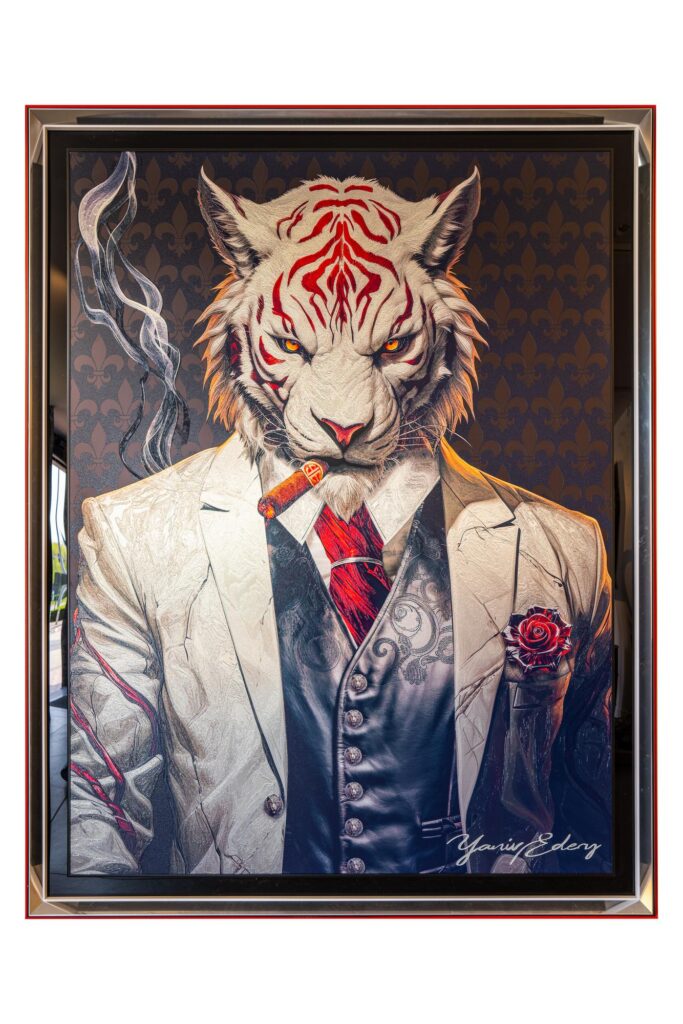 Yaniv Edery – White Tiger Cigar White Tiger Cigar van Yaniv Edery toont een trotse witte tijger, gekleed in een stijlvol wit kostuum. Met een rode das, een roos in het knoopsgat en een brandende sigaar straalt hij macht, lef en verfijning uit. De intense blik, gecombineerd met de strakke lijnen en krachtige kleuren, maakt het werk tot een echte blikvanger. Het contrast tussen het elegante pak en de wilde kracht van de tijger benadrukt het spel tussen luxe en natuur. De rook van de sigaar geeft een mysterieuze sfeer, terwijl de rode accenten symbool staan voor passie en energie. Elk detail, van de textuur van de stof tot de scherpe strepen op de vacht, is met precisie uitgewerkt. Edery creëert hier niet zomaar een portret, maar een symbool. Een symbool van dominantie, status en charisma. Het schilderij is zowel elegant als rebels, een mix die telkens opnieuw de aandacht trekt. De witte tijger, zeldzaam en majestueus, staat centraal als icoon van kracht en onafhankelijkheid. Ervaar de unieke energie die het oproept. Het kunstwerk verandert elke ruimte in een omgeving vol karakter en stijl. Het is niet alleen decoratief, maar ook een krachtig statement dat gesprekken uitlokt.